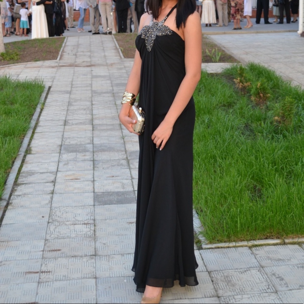 Gorgeous black sheer dress with stones.